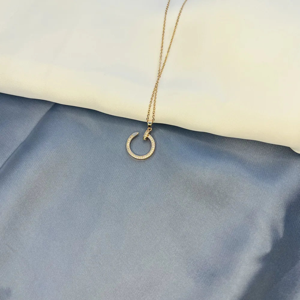 Gold-Tone Crystal-Embellished Crescent Moon Pendant Necklace