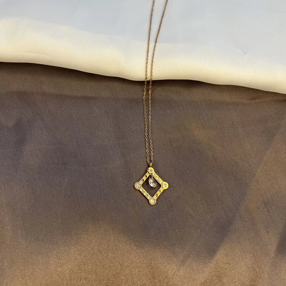 Gold-Tone Square Pendant Necklace with Crystal and Yellow Gemstone Accents