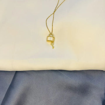 Gold-Tone Lock and Key Pendant Necklace with Crystal Accents