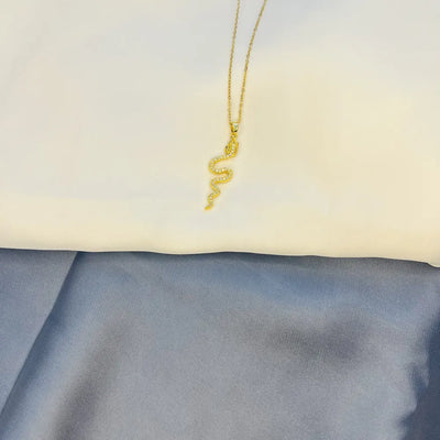 Gold-Tone Snake Pendant Necklace with Crystal Detailing