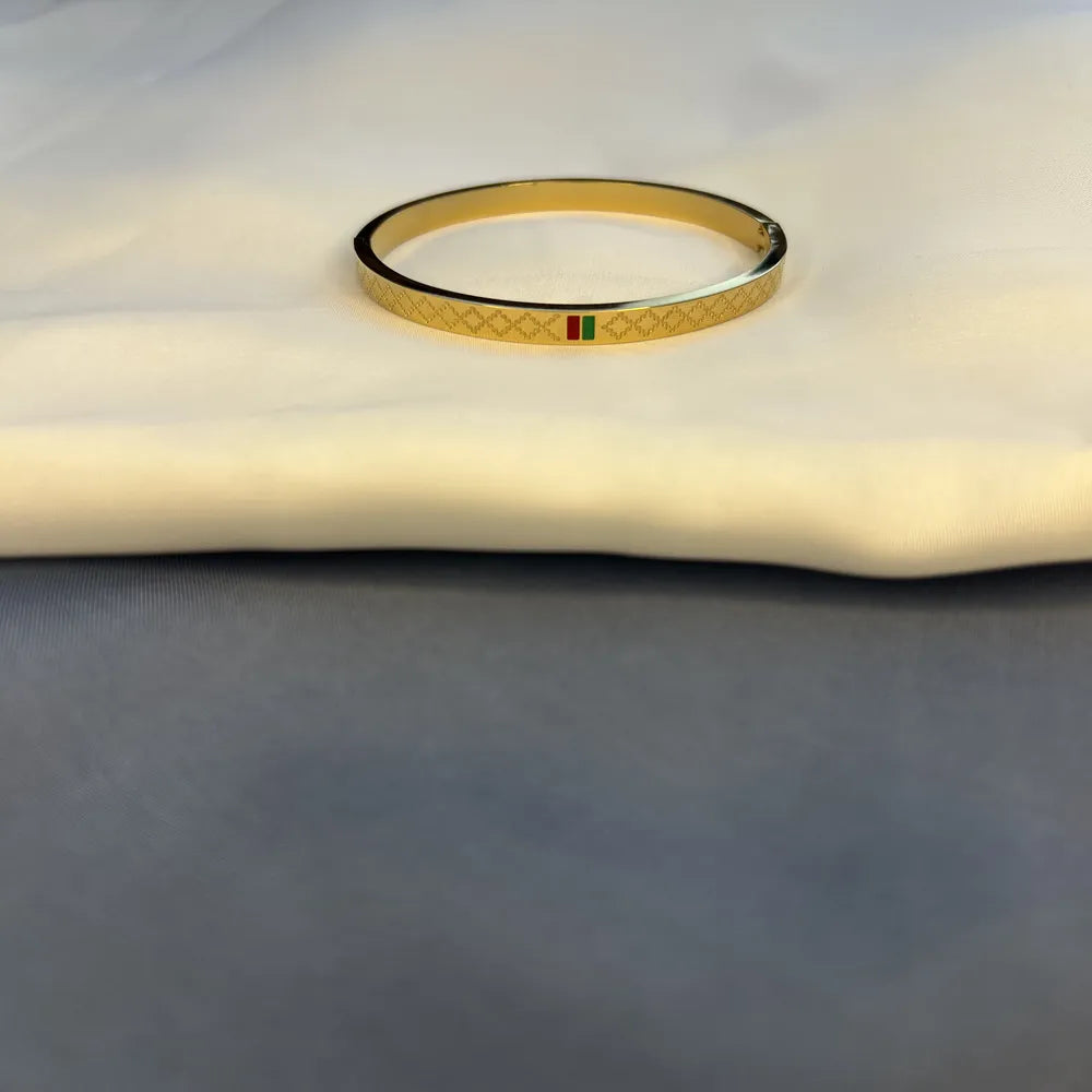 Gold-Tone Engraved Bangle Bracelet with Multicolor Stripe Detail