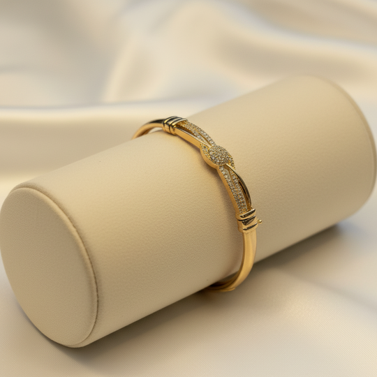 Gold-Tone Bangle Bracelet with Crystal-Studded Center