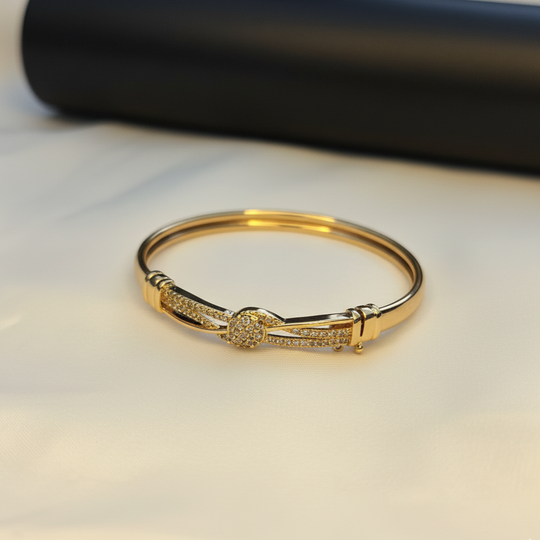 Gold-Tone Bangle Bracelet with Crystal-Studded Center
